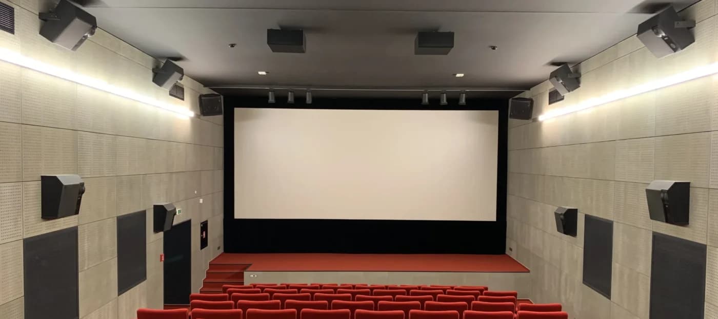 Professional projection screen installation in a cinema